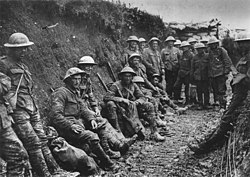 A photograph of British soldiers in a sunken road