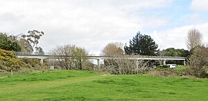 Sewer bridge over the Kirikiriroa Stream carries a walkway/cycleway linking Harrowfield with Queenwood