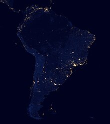 Satellite view of South America at night from NASA, showing the contrast between heavily populated coastal areas and the more remote regions of the Amazonian interior and Patagonia South America night.jpg