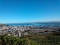 Cape Town and Table Bay from the slopes of Devil's Peak, showing some of the mountain biking jeep tracks.