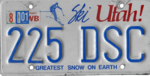 Номерной знак штата Юта, 1985–1990 годы, с наклейкой за август 2001 года.png
