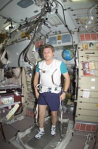 Iouri Onoufrienko sur un tapis roulant à bord de l'ISS.