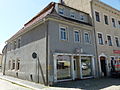 Wohnhaus mit Laden (originale Front) in geschlossener Bebauung und Ecklage