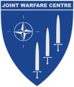 Герб United Warfare Centre.svg