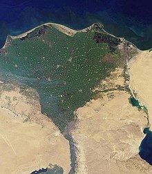 Nile River delta, as seen from Earth orbit. The Nile is an example of a wave-dominated delta that has the classic Greek letter delta (D) shape after which river deltas were named. NileDelta-EO.JPG