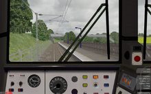 A screenshot of openBVE featuring a view from a locomotive cab.
