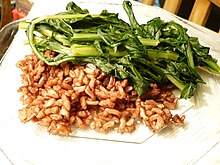 Plate of sauteed dandelion greens, with Wehani rice Plate of Wehani rice with sauteed dandelion greens.jpg