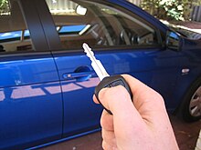 Pressing a button on the key unlocks all of the car doors. Another button locks the car. Remote central locking.jpg