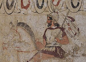 Return of the warrior. Detail of fresco from the Lucanian tomb, 4th century BC. Return of the warrior. Detail of Lucanian tomb.jpg