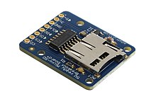 This breakout board allows an SD card's pins to be accessed easily while still allowing the card to be hot-swapped. SD Card Breakout Board.jpg