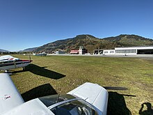 Photo of Zell am See Airport in front of two airplanes