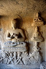 052 Cave 15, Buddha on Lotus Throne (33811678612).jpg