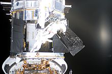 NASA astronauts of Space Shuttle mission STS-109 remove FOC during an EVA ACS FOC swap.jpg