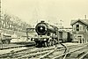 Locomotive 872 Auld Reekie departs Edinburgh with an express passenger service circa 1911