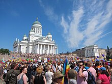 People gathering at the Senate Square, Helsinki, right before the 2011 Helsinki Pride parade started Helsinki Pride Parade I (5897488480).jpg