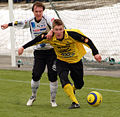 Kalle Parviainen in het geel, in april 2005 geboren op 3 oktober 1982