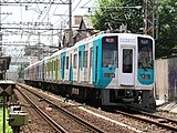 1002F minapitaラッピング （2006年7月 帝塚山駅付近）