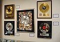 Image 17Platinum records by Elvis Presley, Prince, Madonna, Lynyrd Skynyrd, and Bruce Springsteen, at Julien's Auctions (from Album era)