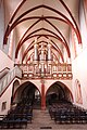 Blick in das Kirchenschiff vom Chorraum aus mit Orgelempore und Schöler-Orgel im Kloster Altenberg (Solms)