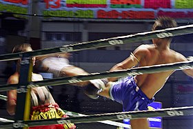 Thai boxing high kick.jpg