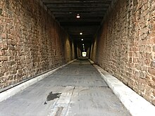 The Lincoln Street Tunnel - A pedestrian and bicycle-only tunnel converted from a former railroad tunnel, which crosses under Lincoln, Washington, and Hampton Streets The Lincoln Street Tunnel in Columbia, SC.jpg