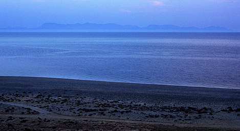 Η Ίμβρος όπως φαίνεται από την παραλία Κήπων από τη Σαμοθράκη (την ώρα δύσης ηλίου).