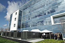 Several fuel cells installed outside of a large office building