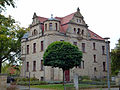 Villa mit Einfriedung