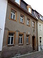 Wohnhaus in geschlossener Bebauung und Hintergebäude