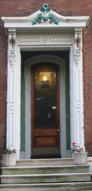 The front door of a house is often decorated t...