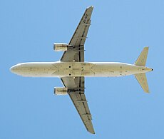 Planfoto van 'n IBERIA A320 wat vanaf Londen Heathrow opstyg.