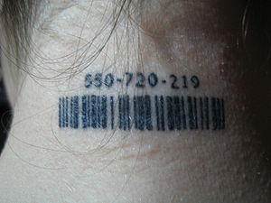 Barcode tattoo with "TSR" number bas...