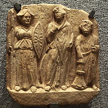 Bas-relief: Nemesis, al-Lat and the dedicator. Palmyrene, 2nd-3rd century CE. Nemesis Allat and dedicater-MBA Lyon-IMG 0557.JPG