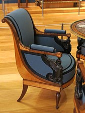 Armchair of the salon of Madame Récamier; attributed to Jacob Frères; c.1798; various types of wood; 84.5 x 62.2 x 62 cm; Musée des Arts Décoratifs[72]