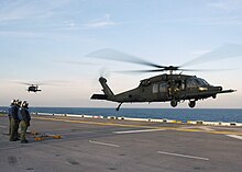 MH-60 from the 160th SOAR(A) lands aboard the USS Bataan. Two UH-60M, 160th SOAR on USS Bataan on 10 Feb. 2006.jpg