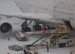 Loading luggage at Boston Logan Airport, during a temporary closure due to heavy snow falls