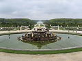 Fountain with Versailles gardens in the background