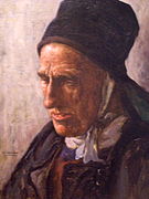 Henri Guinier : Vieille Bretonne portant un capot sur la tête.