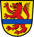 Gemeinde Aholming In Gold ein mit einem blauen Balken überdeckter, steigender roter Wolf.