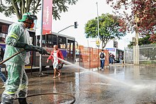 Disinfection of public area in Itapevi, Brazil, in April 2020 (2020.04.17) Higienizacao entrada estacao da CPTM (49784811813).jpg