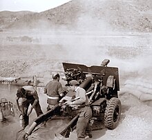 New Zealand gunners in action in Korea, April 1952 02 Dad in action april1952 Korea sepia.jpg