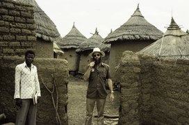 A Burkina agricultural extension officer with Van der Kraaij, program officer, Plateau-Central Region, Burkina Faso, 1982.