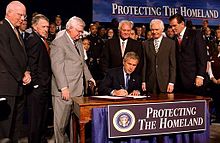President George W. Bush signs the Homeland Security Appropriations Act of 2004. Appropriations Act of 2004.jpg