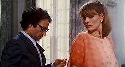 Enrico (Enrico Montesano) és Monique (Janet Ågren) a film egyik jelenetében