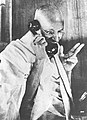 Gandhi telephoning