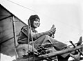 Image 6 Hélène Dutrieu Photo credit: Bain News Service Hélène Dutrieu, shown here in her aeroplane ca. 1911, was the fourth woman in the world (the first from Belgium) to earn a pilot's license and reputedly the first woman to carry passengers and to fly a seaplane. Besides being a pilot, she was a cycling world champion, stunt cyclist, stunt motorcyclist, automobile racer, wartime ambulance driver, and director of a military hospital. More selected pictures