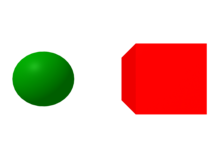 Grüne Kugel und roter Würfel