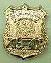 English: A badge of a police dog within the Ne...