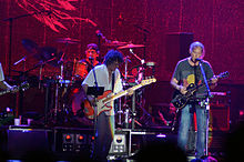 Ralph Molina (drums), Billy Talbot (bass), Neil Young (guitar) in 2012