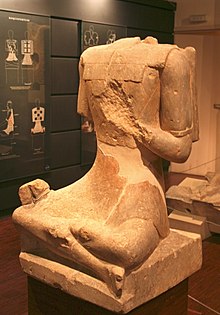 Seated warrior from Roquepertuse, Marseille History Museum Roquepertuse. Statue de guerrier.jpg